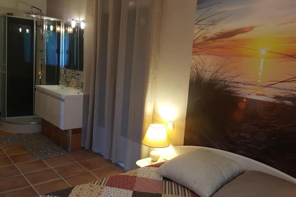 Chambre climatisée — © Appartement Piscine au Sel