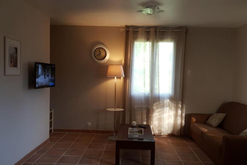 Terrasse et jardin — © Appartement Piscine au Sel