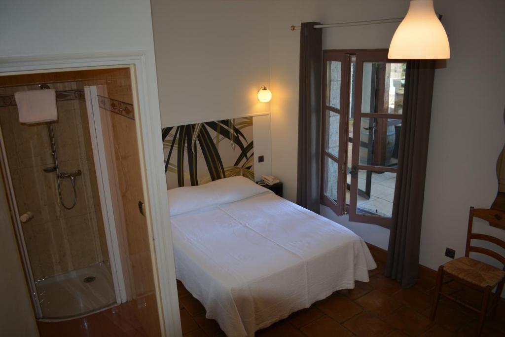 Chambre Classique — © Hôtel des Consuls