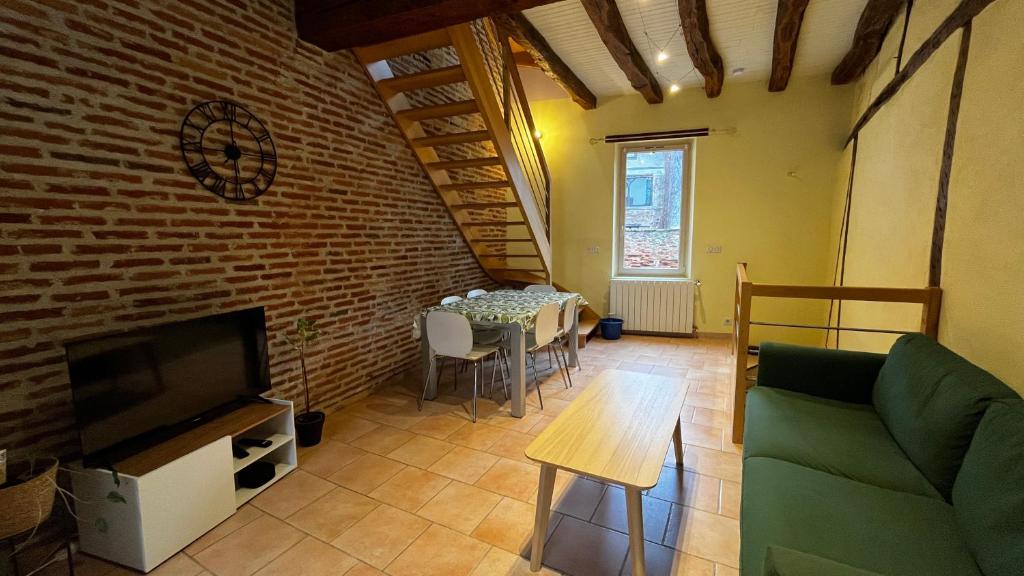 Chambre fleurie — © Le Gîte d'Eugénie