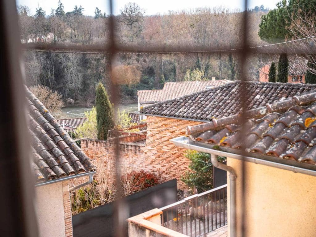 Vue sur les toits et le Tarn — © Les Ateliers de Philadelphe