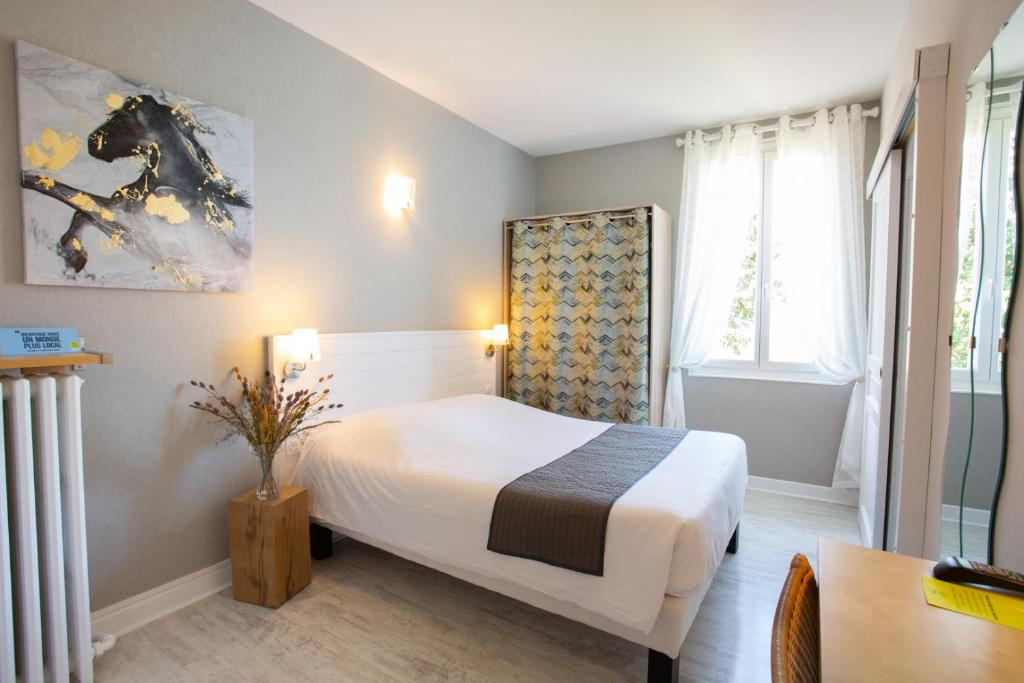 Chambre — © Hôtel L'Occitan